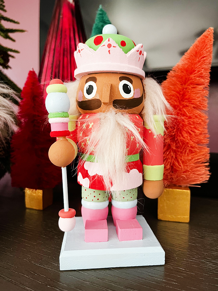 Nutcracker holding sceptor.