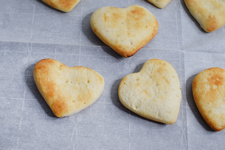 Pizza dough cut into hearts and lightly browned in the oven.