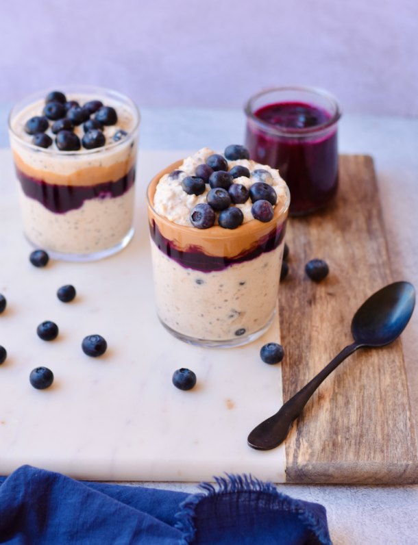 Jars of peanut butter and blueberry overnight oats.