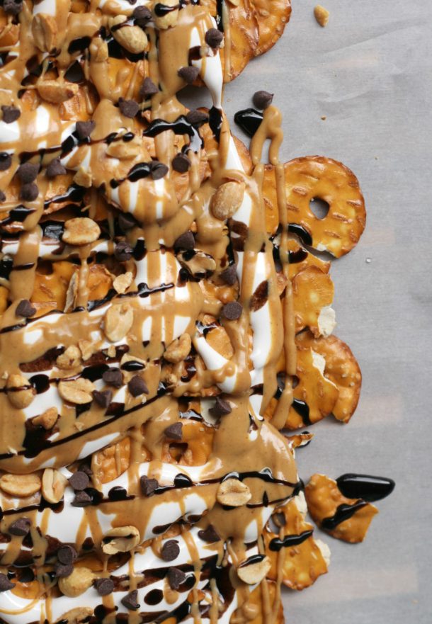Dessert nachos with pretzels, peanut butter, marshmallow, and chocolate.