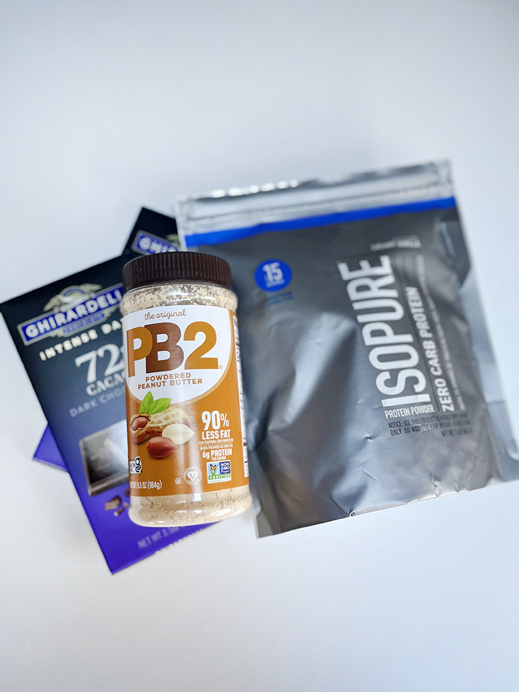 Ingredients to make healthy Reese's eggs, including PB@ powered peanut butter.