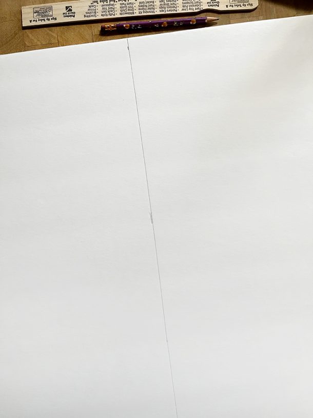 Foam board with a line drawn down the middle.