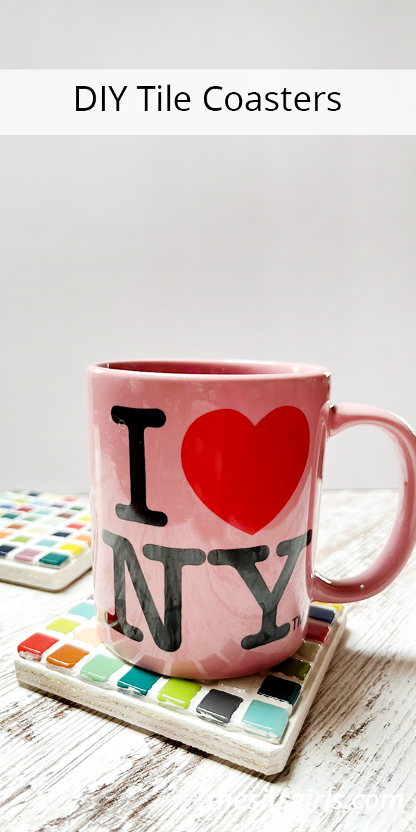 Picture of a pink mug with I heart NY sitting on mosaic tile coasters under the words DIY Tile Coasters.